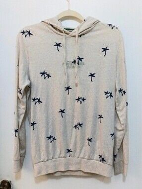 DENIM & FLOWER Ricky Singh Cream Hoodie with Navy Palms Detail.